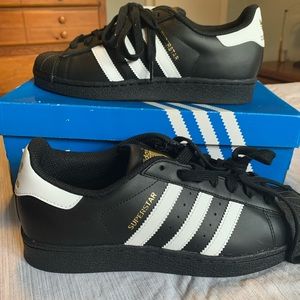 Black and white superstar adidas